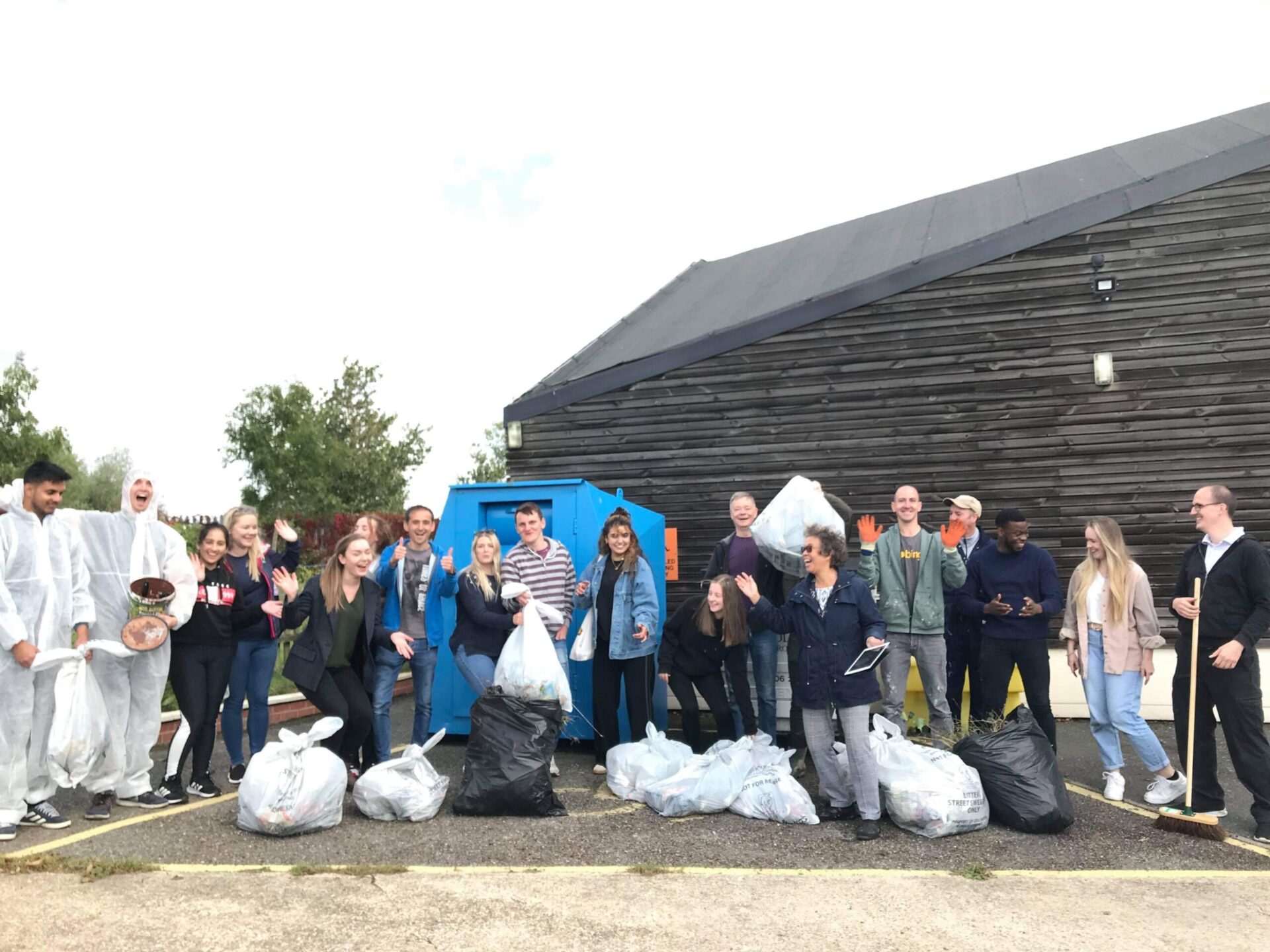 Footprint Digital Team with bin bags after collecting rubbish at the Rotary Club