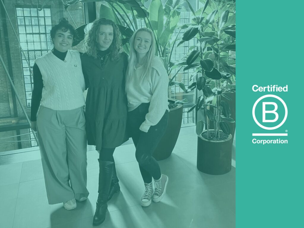 B Corp logo blog header image with Kaya, Bailey, and Charlotte and teal image overlay