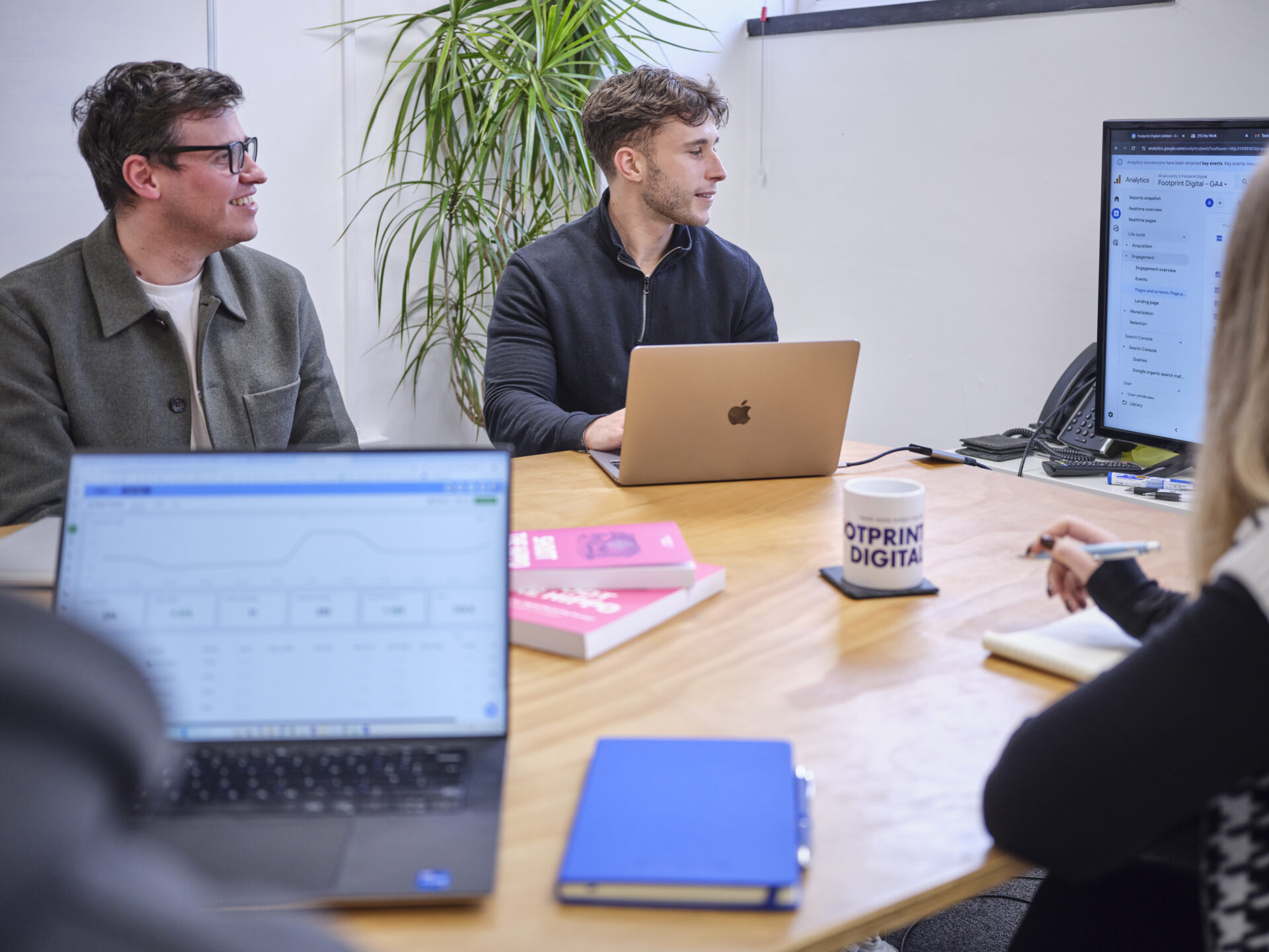 Full colour office shot meeting room 1 Tom C, Joe K and team having a meeting