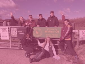 Pink apprentice challenge group shot at wellies on farm