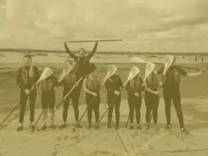 Yellow group shot apprentice challenge paddleboarding in mersea