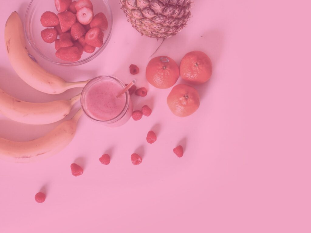 Pink flat lay of fruits