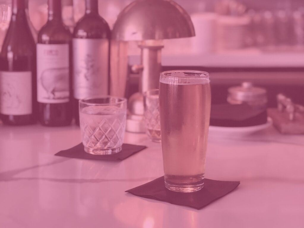 Pink beer and wine in a bar