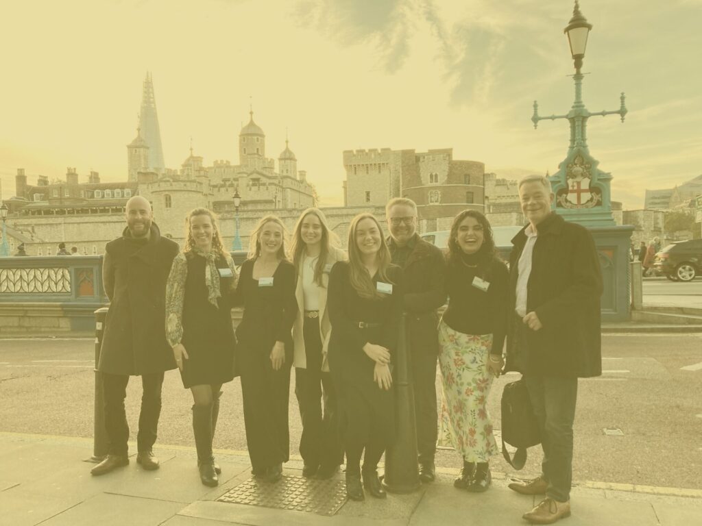 Yellow group shot outside tower of london for rpc event